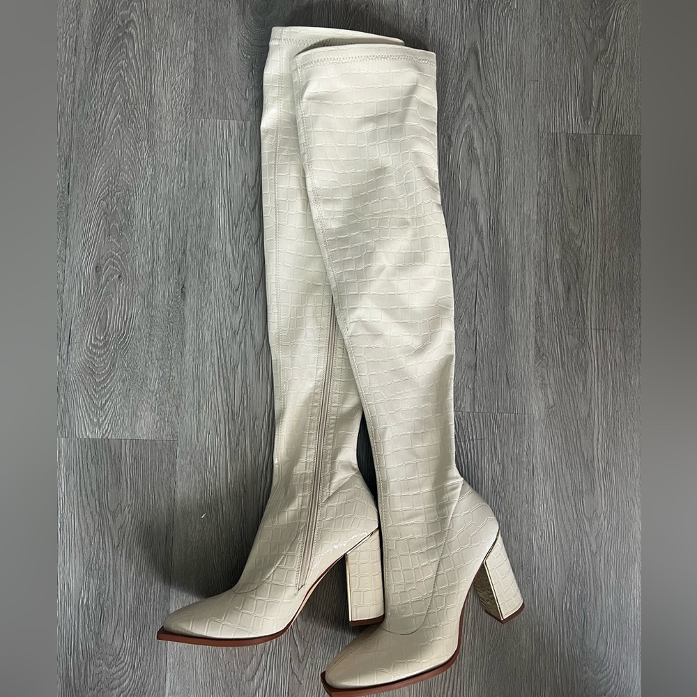 Cream faux leather boots from Simmi shoes